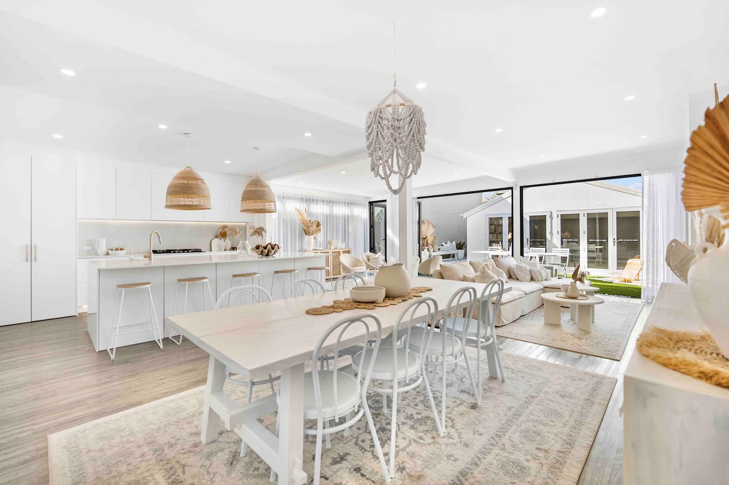 Shared dining space opening onto the outdoor area